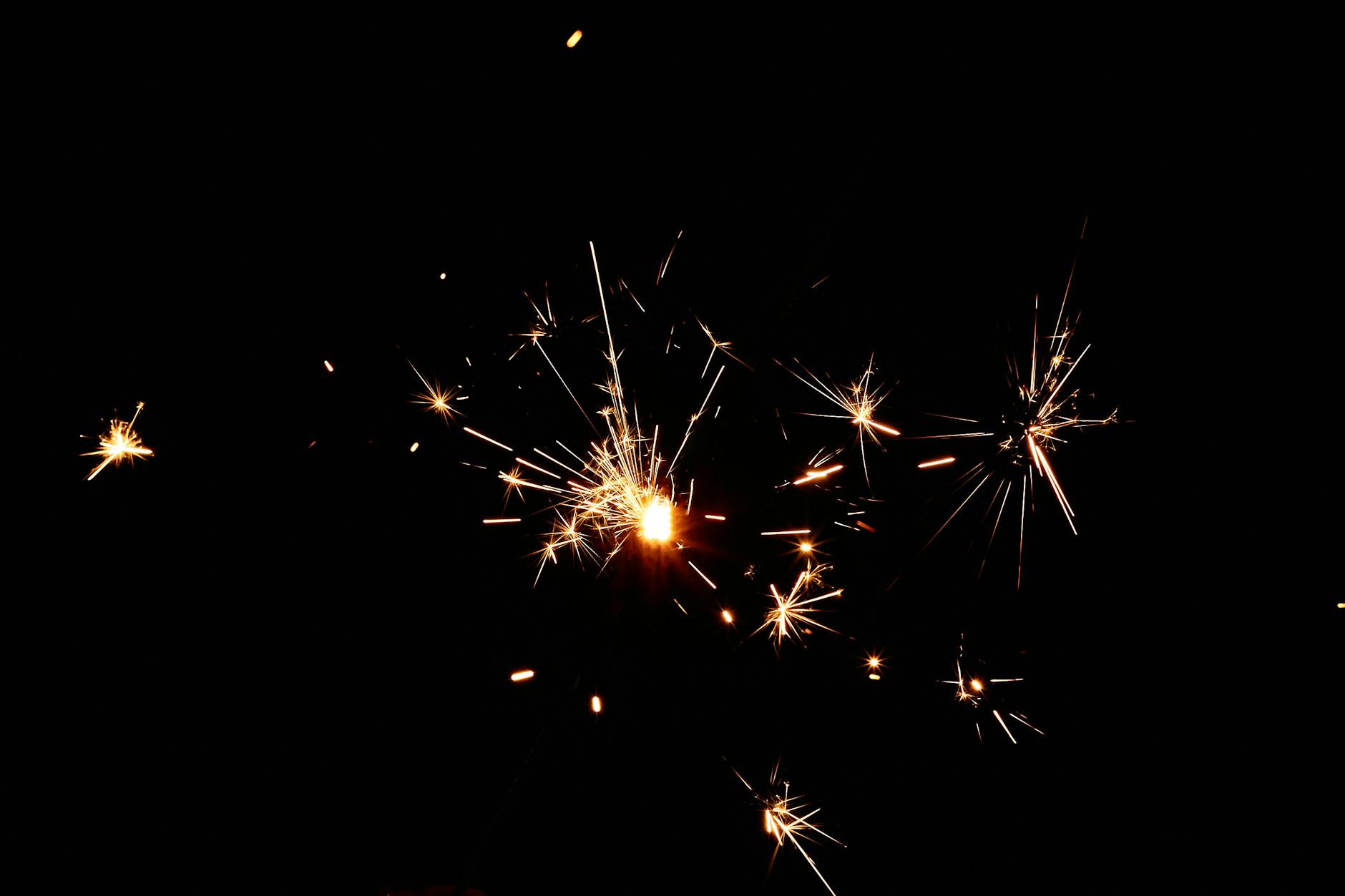 sparkling lights on black background